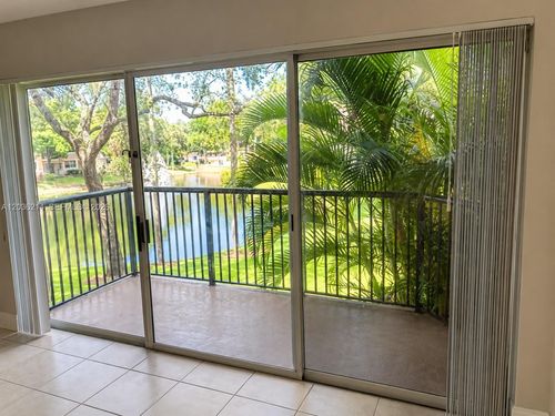 204-8741 Wiles Rd, Coral Springs, FL, 33067-1884 | Card Image