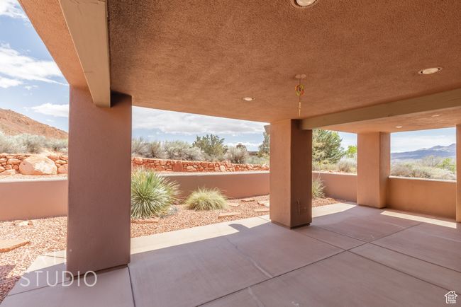 View of patio / terrace with a mountain view | Image 8