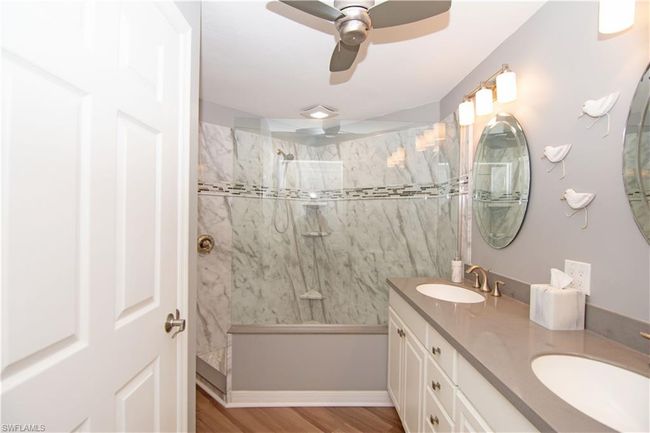 Enjoy your Spa-like bathroom with oversized shower, dual vanities with quartz countertops and separate water closet. | Image 20