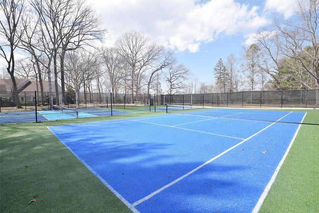 View of sport court featuring fence | Image 17