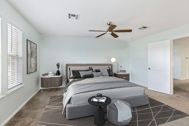 Carpeted bedroom featuring baseboards and a ceiling fan | Image 5