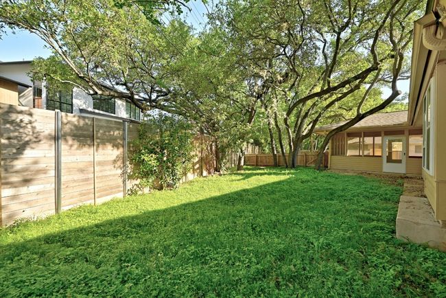 View of yard featuring a fenced backyard | Image 28