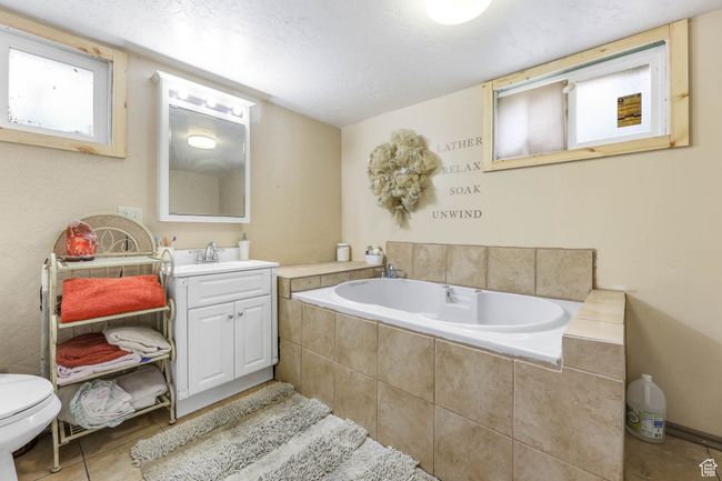 Basement Bathroom Featuring Jetted Tub | Image 16