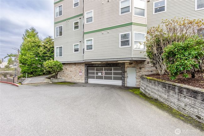one of 2 entrances to the garage parking area. | Image 21