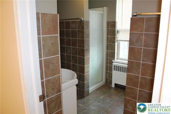 1st floor full bathroom | Image 6