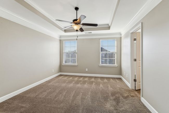 Owners' suite with trey ceiling | Image 28