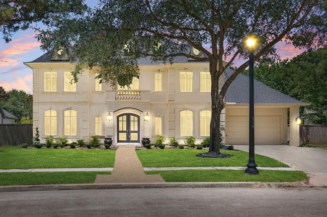 Elegant stucco home with three-car, tandem-style garage offering everything you are looking for including a private and gated section of Cinco Ranch with easy access to 1-10 and Grand Parkway. | Image 4
