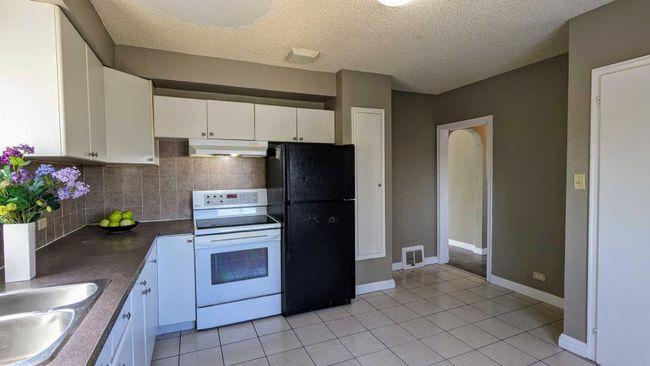 3414 Centre Street N, Home with 4 bedrooms, 2 bathrooms and 4 parking in Calgary AB | Image 7