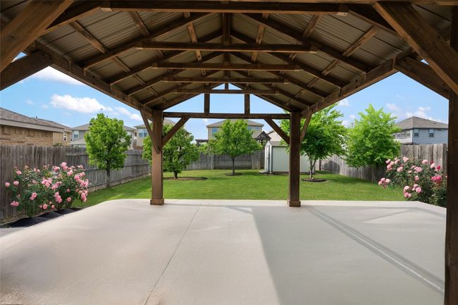 Some of the best features are this gorgeous pergola and a TESLA charger in the garage. | Image 5