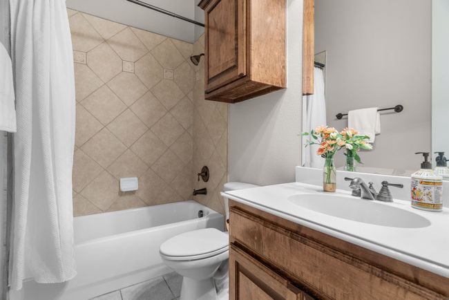 Full bath adjacent downstairs bedroom off playroom/den | Image 21