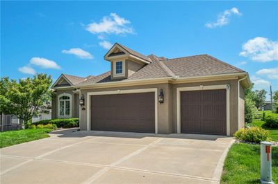 View of front facade featuring a 3 car garage | Image 2