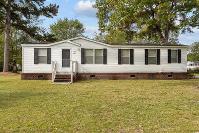 Manufactured / mobile home with a front yard | Image 2