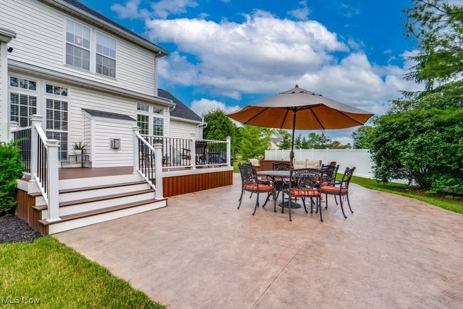 View of patio / terrace with outdoor dining area and a deck | Image 42