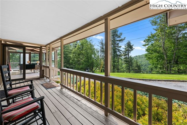 Rocking chair front porch. | Image 5