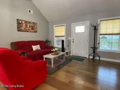 Vaulted Living Room with engineered hardwood floors | Image 2