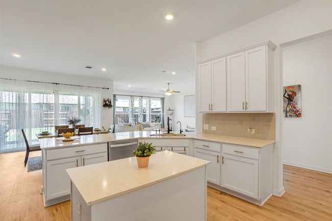SPECTACULAR KITCHEN WITH CENTER ISLAND, QUARTZ COUNTERS, STAINLESS APPLIANCES & CABINETS GALORE !!! | Image 13