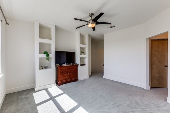 Unfurnished bedroom featuring carpet flooring and baseboards | Image 22