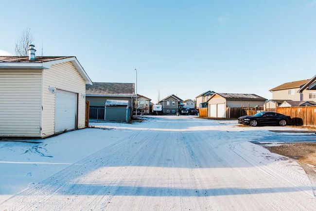 8842 66 Avenue, Home with 4 bedrooms, 3 bathrooms and 3 parking in Grande Prairie AB | Image 37