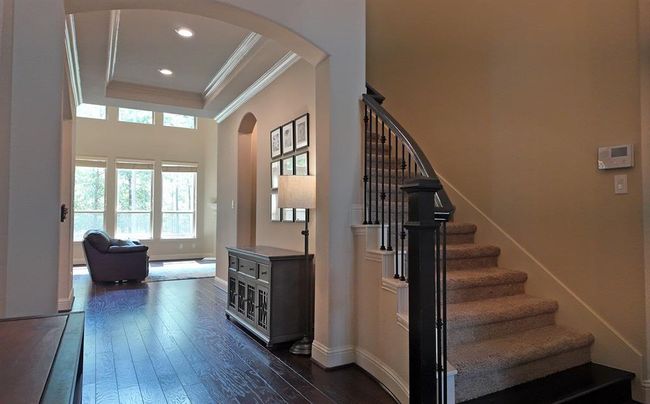 View upon entering home; cascading stair | Image 5