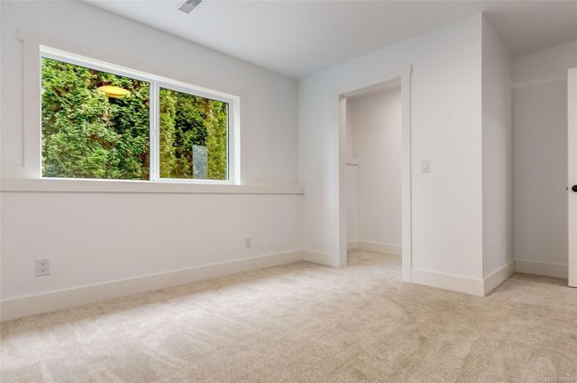 downstairs bedroom with walk in closet | Image 75