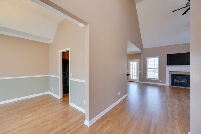 Large formal dining room to the left of the entryway for more entertaining space. | Image 8