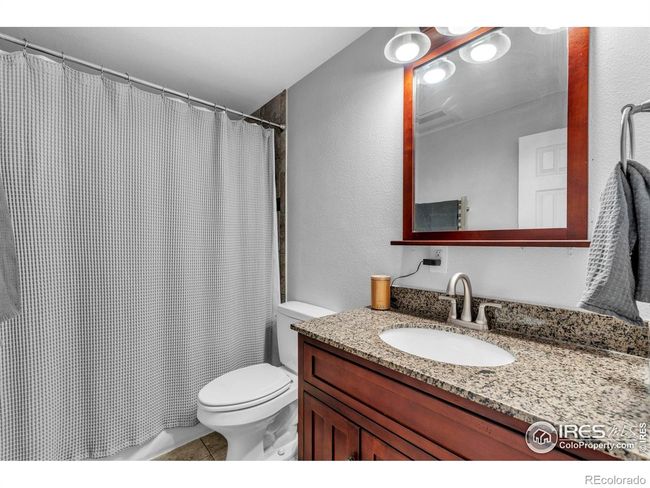 Newer vent fan and heater in bathroom, and heated towel warmer | Image 21