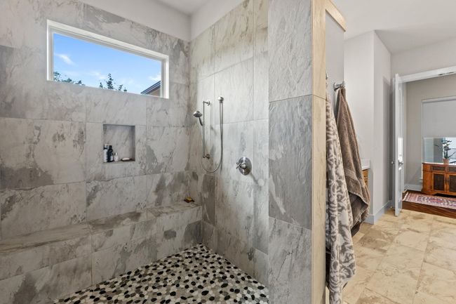 Full bathroom featuring tiled shower | Image 19