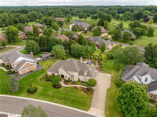 Aerial view featuring a residential view. You can see the private lot and the back patio. | Image 5