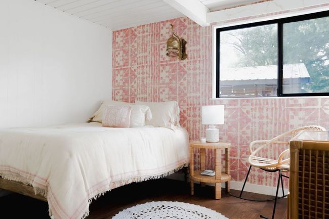 Bedroom featuring wood finished floors and beamed ceiling | Image 25