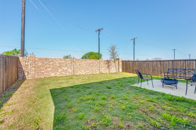 View of yard featuring a patio and a fenced backyard | Image 21