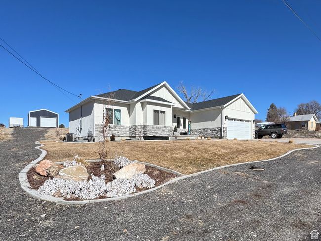 View of front of home featuring a garage | Image 40