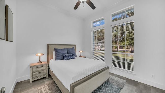 Bedroom with crown molding and a ceiling fan | Image 19