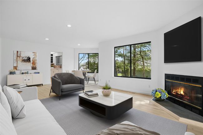 Virtually staged. This room provides ample room for informal dining and for everyone to gather. | Image 7