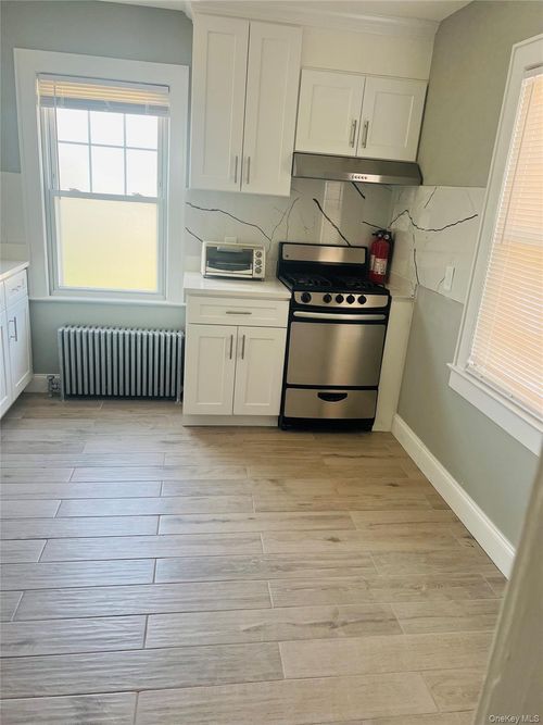 67 Madison Ave, Westbury, NY, 11590-4309 | Card Image