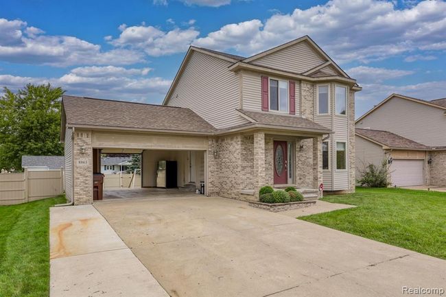 8863 Railwood Drive, Home with 3 bedrooms, 2 bathrooms and null parking in Berlin Twp MI | Image 3