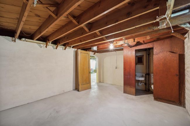 A second room on the lower level that could be finished off with a half bath. | Image 23