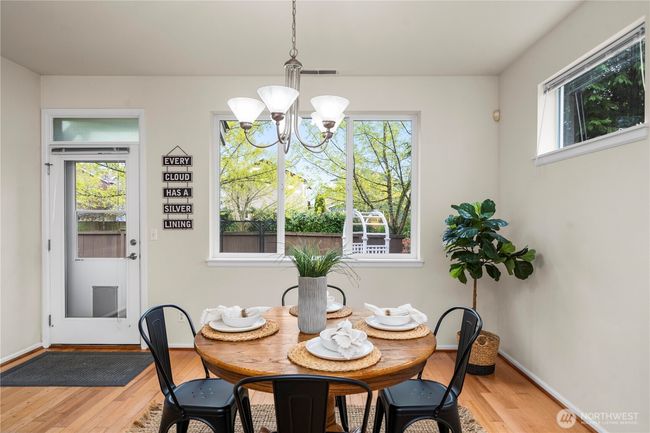 sprawling kitchen/dining area flows seamlessly out to the back patio and into the large living room! | Image 16