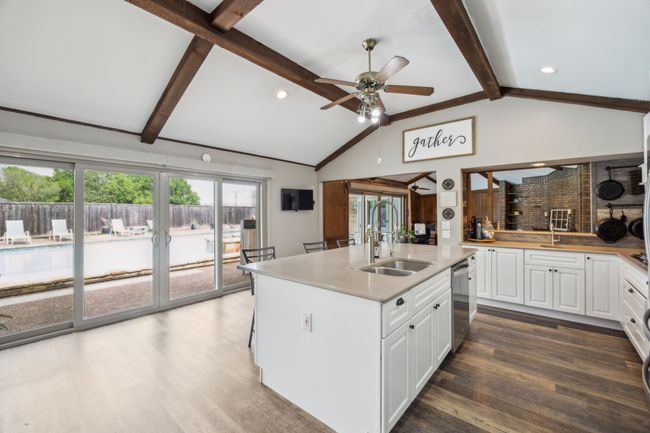 Massive Kitchen Island Overlooking the Pool | Image 12