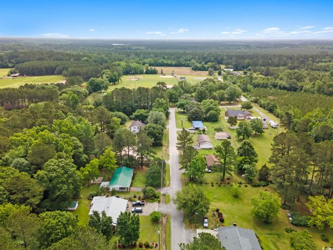 Aerial view of a heavily wooded area | Image 38
