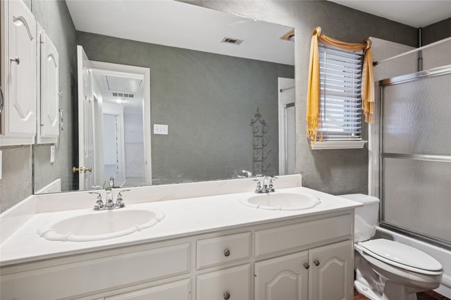 Upstairs bathroom 2 with tub shower combo & dual sinks | Image 33