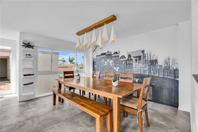 Dining area with mural of Holland Neighborhood | Image 6