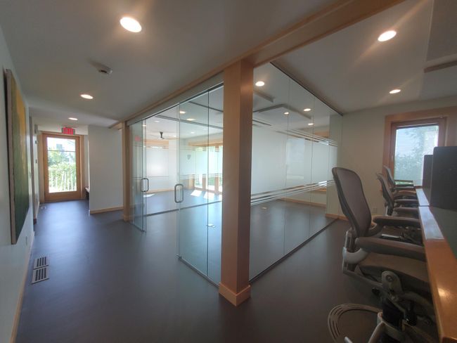 Glass enclosed private office on main level | Image 15