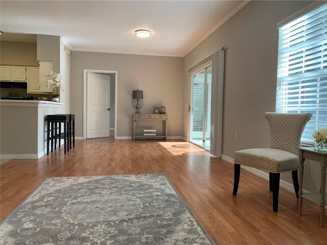 Living room area looking toward dining room | Image 4