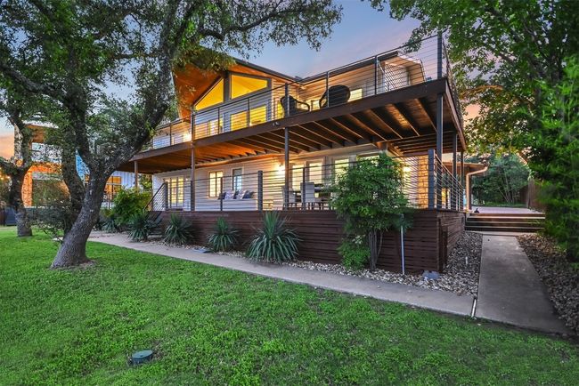 The backyard offers plenty of space for outdoor activities and is perfect for adding a pool if desired | Image 4