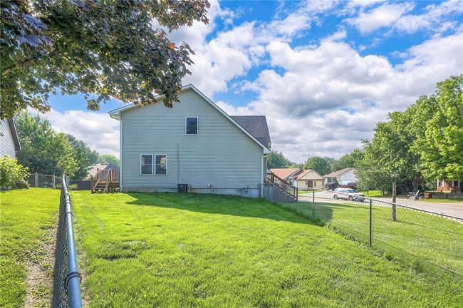 View of home's exterior featuring a fenced backyard | Image 26