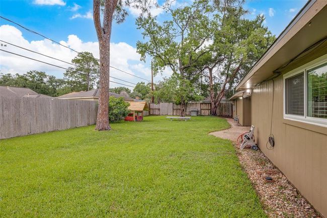 Wonderful large backyard with mature trees - plenty space if you would like to add a pool! | Image 29