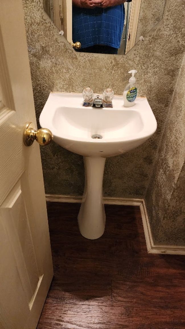 Bathroom featuring wood finished floors and a sink | Image 4