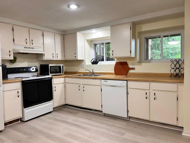 Unit 3 Kitchen with everything you need for that rental, mother in law suit! | Image 44