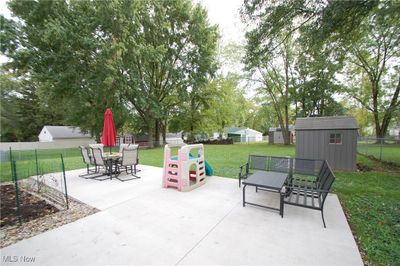 View of patio featuring a storage unit | Image 3