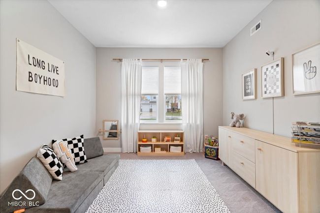 living area featuring light carpet | Image 7